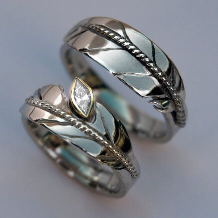 Oshkigin Ojibwe eagle feather wedding rings set Love