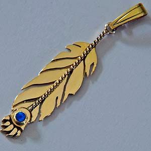 Manidoo migizi miigwan gold feather pendant