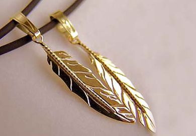 Two-Spirit eagle feather pendants Migizi Miigwan