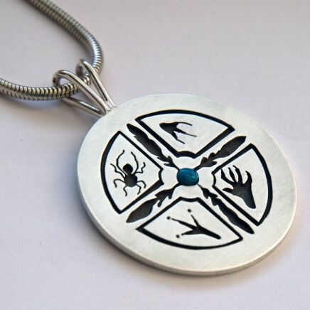 Sterling silver Native American Medicine wheel designed and handcrafted by Native Woodland jeweler Zhaawano