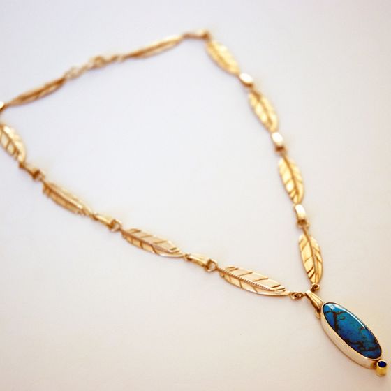 Grandmother's Journey Ojibwe gold turquoise sapphire eagle feather necklace