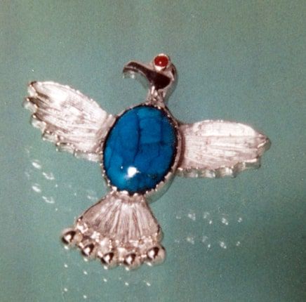Anishinaabe-inspired brooches and tie-pins 