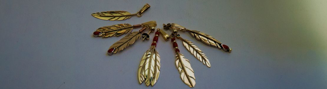 Anishinaabe-inspired eagle feather jewelry by ZhaawanArt Fisher Star Creations
