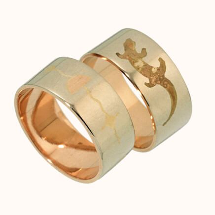 Gold inlaid fisher star wedding ring set